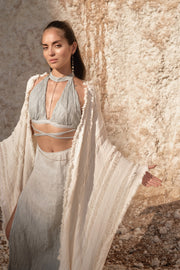 Versatile Organic Linen and Bamboo Gauze Top with Adjustable Neck and Wrap-Around Style, Ombre Dye, embodying Comfort, Sensuality, and Sustainable Elegance.